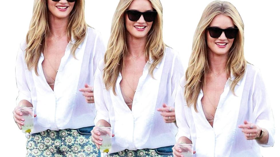 I BLUSE: Rosie Huntington-Whiteley styler blusen med kule, korte shorts med broderier. Foto: Stella