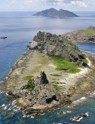 Kina truer med � strupe Japans �konomi