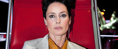 Her sitter Aqua-Lene i mentorstolen uten truse