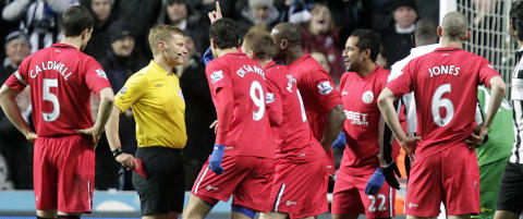 �Brutal� dommeravgj�relse �dela kampen for Wigan