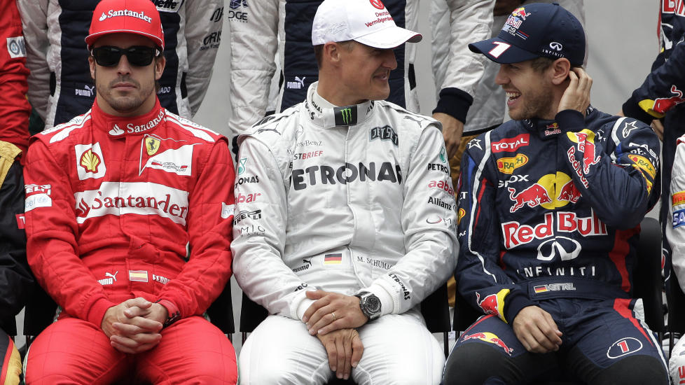 ARVTAKEREN: Sebastian Vettel (t.h) har f�tt skryt av Michael Schumacher (midten) og kan etterf�lge Fernando Alonso (t.v) i Ferrari. Foto: AP / Victor R. Caivano