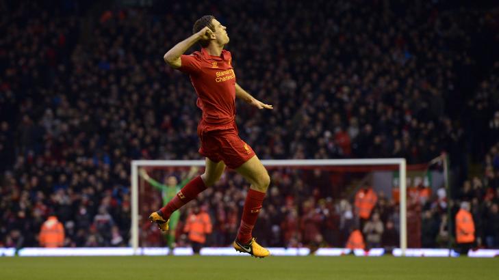 STARTET FESTEN: Jordan Henderson feirer 1-0-m�let mot Norwich. Foto: PAUL ELLIS, AFP / NTB SCANPIX