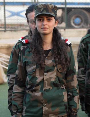 Assads l�vinner: �Med v�rt blod og v�re sjeler, ofrer vi oss for deg, o store Bashar�