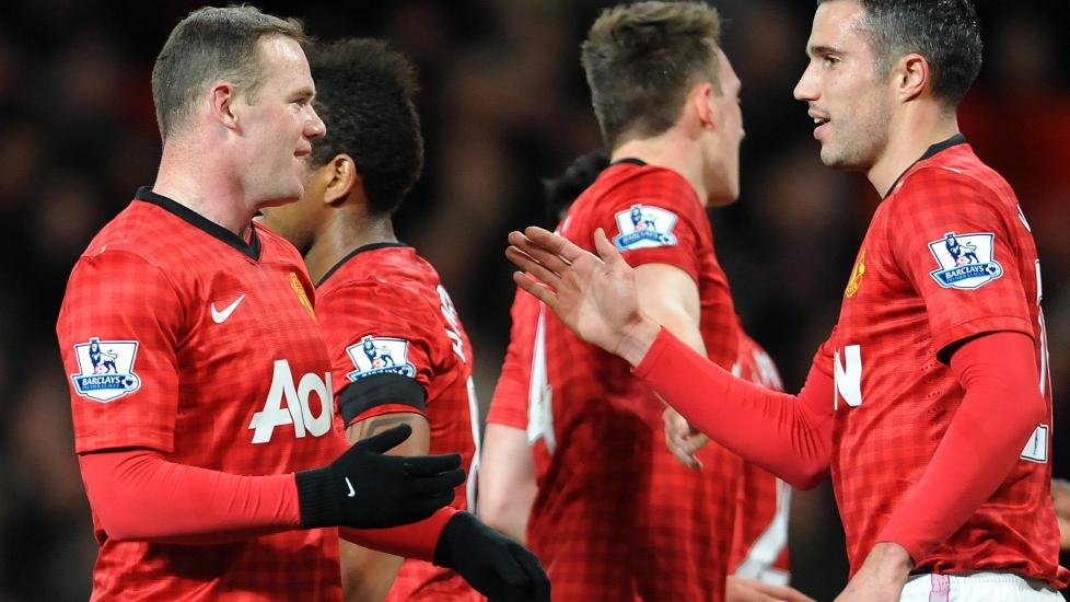 SCORET TO: Wayne Rooney (t.v.) scoret begge Uniteds m�l da de dro i land en heldig seier mot Southampton. Foto: Peter Powell / EPA / NTB Scanpix