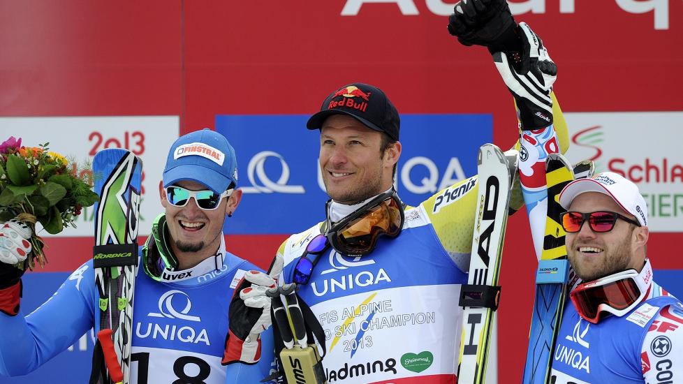 GULLGUTTEN: Aksel Lund Svindal (i midten) var utiln�rmelig da han vant sitt andre VM-gull i utfor. Dominik Paris (t.v.) og David Poisson fikk henholdsvis s�lv og bronse. Foto: Samuel Kubani / AFP / NTB Scanpix