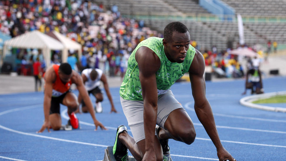 BEST I SITT HEAT: Usain Bolt vant sitt heat, men l�p ikke like fort som Yohan Blake og Warren Weir. Foto:  REUTERS/Gilbert Bellamy/NTB scanpix