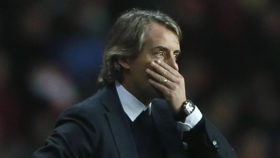 PRESSET: Tidligere Manchester City- og England-spiller Danny Mills tror Roberto Mancini f�r sparken dersom klubben ryker ut av FA-cupen mot Leeds. Foto: STEFAN WERMUTH / REUTERS / NTB scanpix