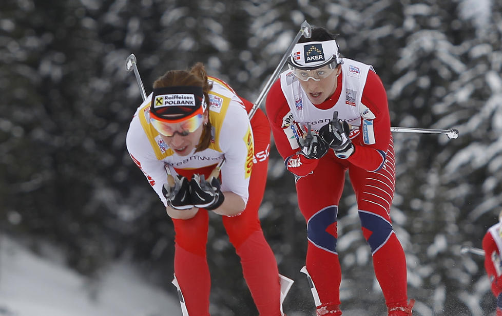 POLSK SEIER: Marit Bj�rgen ble nummer to p� sprinten i Davos. Justyna Kowalczyk vant. Foto: AP Photo/Laurent Cipriani