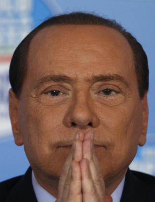 Berlusconi d�mt til fengsel