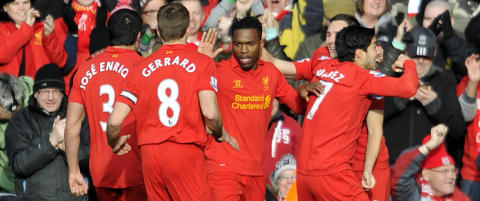 Topp fire-h�pet lever for Liverpool etter seier over Tottenham