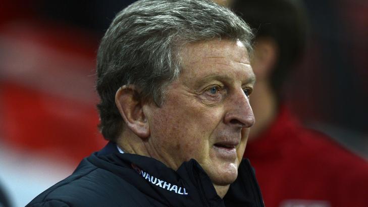 OPTIMIST: Roy Hodgson tror ikke det vil by p� problemer at Ferdinand n� er tilbake i landslagsvarmen. Foto: AFP PHOTO / ADRIAN DENNIS / NTB scanpix