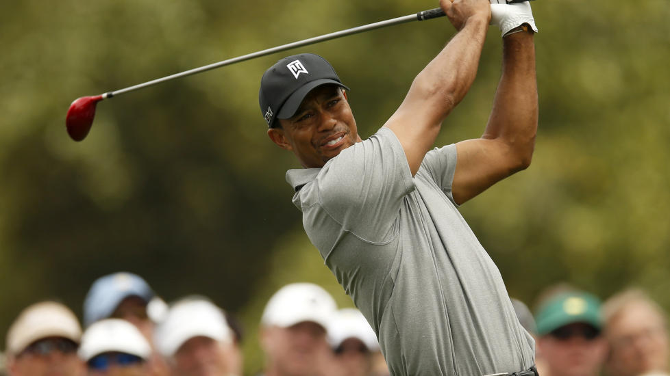 FORN�YD: Tiger Woods er forn�yd med sin egen �pning av US Masters. - Jeg traff ballen godt, sier han selv. Foto: Reuters / Mark Blinch / NTB Scanpix
