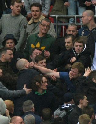 Slossing overskygget Wigans store dag