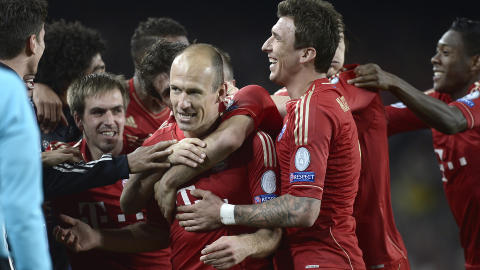 �PNET FESTEN:  Arjen Robben scoret kveldens flotteste m�l da han scoret 1-0 for Bayern like etter pause. Foto: Manu Fernandez, AP / NTB Scanpix