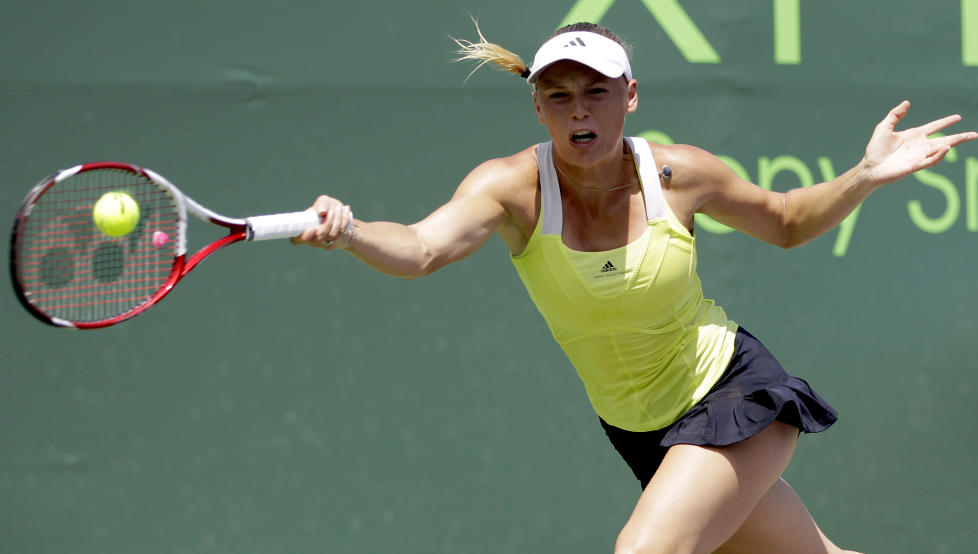 MISBRUKES: Caroline Wozniacki brukes i en slankereklame p� Facebook som hun slett ikke har stilt opp p�. Foto: Alan Diaz, AP / NTB Scanpix