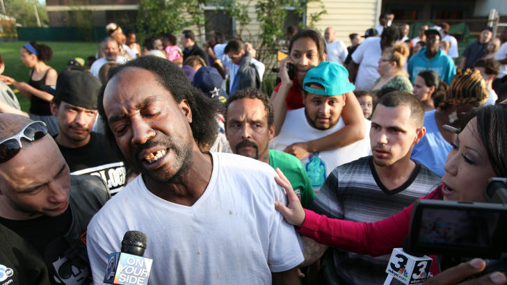 H�RTE ROP OM HJELP: Det var naboen Charles Ramsey som hjalp Amanda Berry ut av huset da han h�rte rop om hjelp i g�r. Foto: Scott Shaw / The Plain Dealer / AP Photo