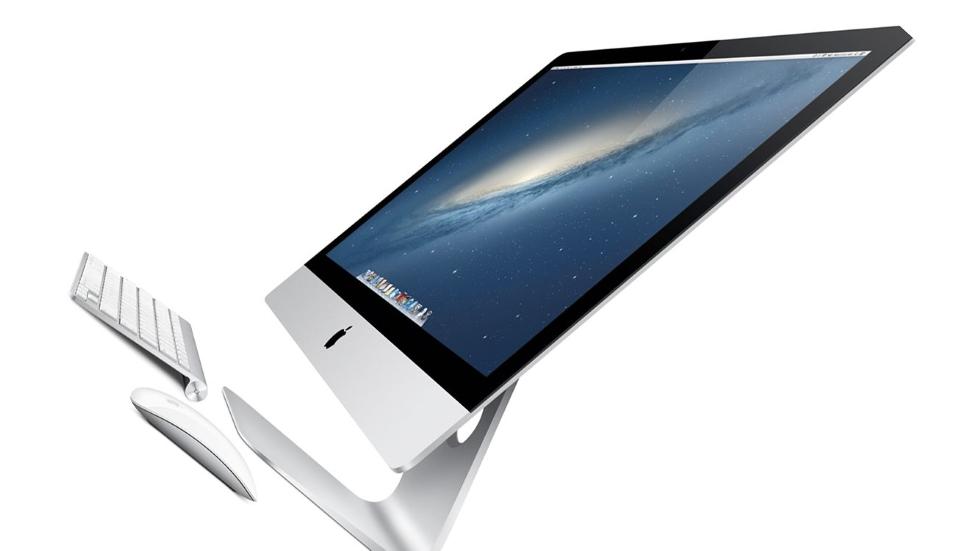 LEKKER: I denne vinkelen ser Imac veldig tynn ut. Sannheten er at den buler ut p� baksiden, men den er fortsatt den lekreste alt-i-ett-maskinen p� markedet. Foto: Produsent