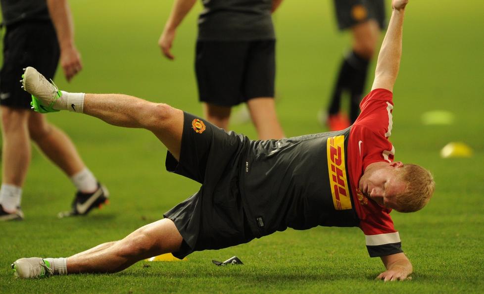   YOGATIMER:  Paul Scholes kommer til � spille en rolle for Manhester United, selv etter han har lagt opp. Foto: Peter Parks /APF/ NTB Scanpix.