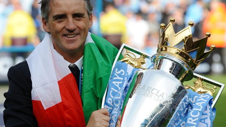  IKKE GODT NOK:  Roberto Mancini tok Manchester City til sitt f�rste Premier League-gull p� 44 �r da klubben gikk helt til topps i fjor. Men det holder ikke hvis man er trof�-l�s �ret etter. Foto: AFP PHOTO / PAUL ELLIS / NTB Scanpix