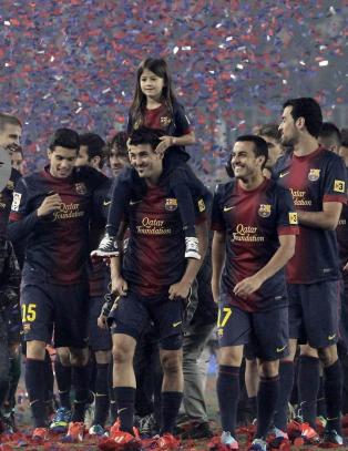 Barcelonas gullfeiring druknet i regn