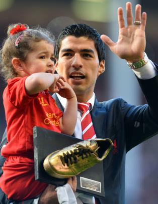 Suarez gir paparazziene skylda for at han vil bort