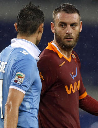 De Rossi oppfordrer fansen til � legge igjen kniver og v�pen hjemme