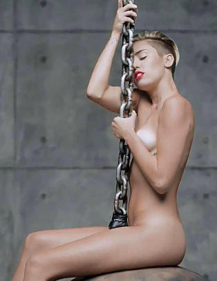 Miley Cyrus ber fansen se bort ifra at hun er naken i sin nye video