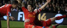Liverpool og Suarez lekte seg med Tottenham på bortebane Liverpool og Suarez lekte seg med Tottenham på bortebane