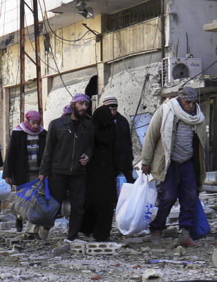 Hjelpearbeidere såret i angrep i Homs