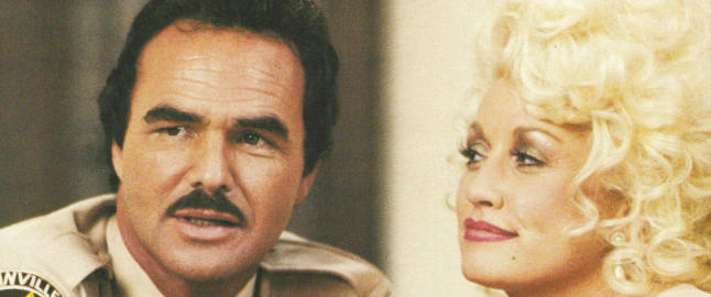 Hva heter han med barten ved siden av Dolly Parton?
