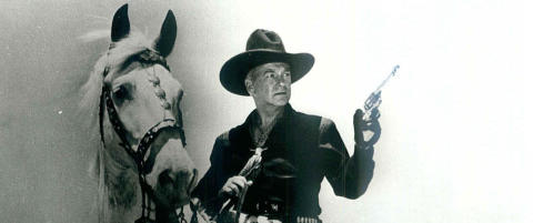 En cowboy letter på hatten
