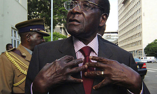 SKYLDER P� STORBRITANNIA: President Robert Mugabe mener at alle Zimbabwes problemer skyldes den gamle koloniherren og st�ttespillerne deres. Han nekter ogs� for � ha tapt valget i v�r. Foto: Philimon Bulawayo/REUTERS/SCANPIX