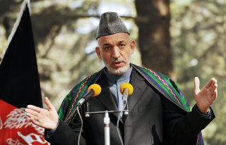NY �RA: Afghanistans presiden, Hamid Karzai, mener valget av en svart president i USA er en ny �ra for landet. Foto:AFP/SHAH Marai/SCANPIX