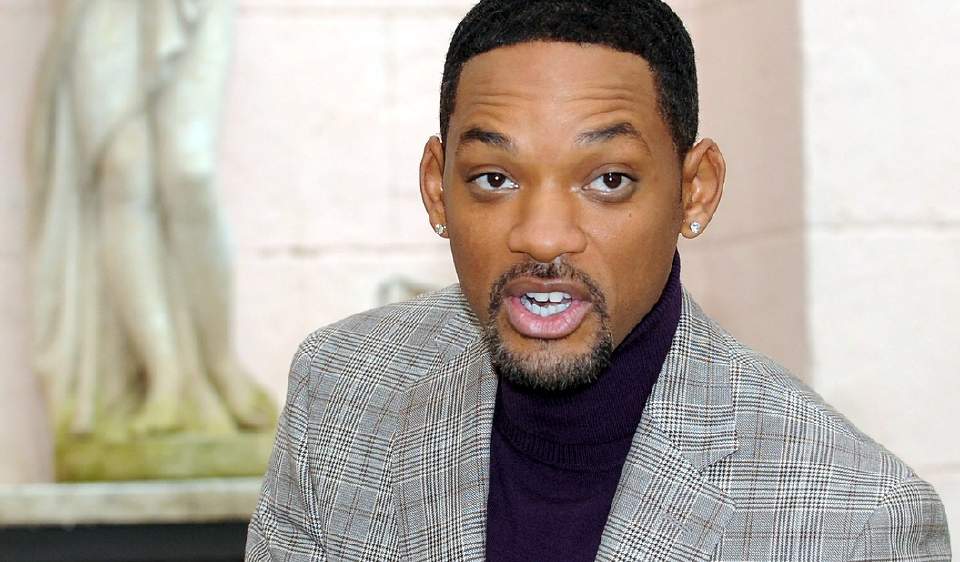 HYLLER OBAMA:Aldri f�r har et folk karet seg fra slaveklassen til toppen, mener Will Smith om Obama som landets nye president. Foto:  EPA/CLAUDIO ONORATI