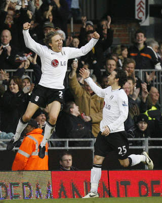 FORLATER FULHAM: Jimmy Bullard (t.v.) har tidvis v�rt meget toneangivende for Fulham denne sesongen, men forlater n� Craven Cottage til fordel for spill p� KC Stadium for Hull City.Foto: AFP PHOTO / Glyn Kirk