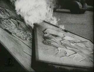 HATET:  Bilder av Stalin og Lenin brenner i Tallinns gater p� invasjonsdagen.
FOTO: EESTI FILMIARHIIV