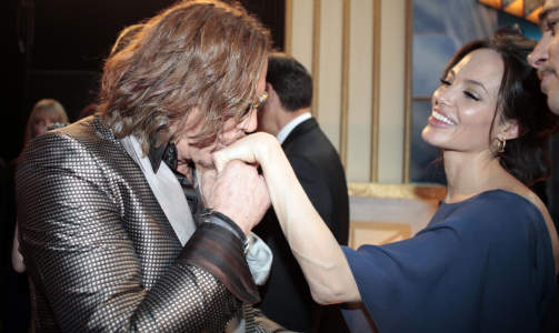 TILBAKE I VARMEN: Mickey Rourke og Angelina Jolie under Screen Actors Guild Awards p� s�ndag. Foto: Scanpix