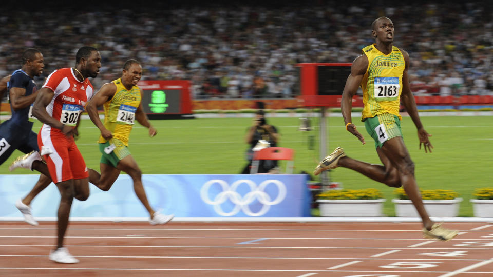 GANSKE RASK: Usain Bolt tror han kan gj�re det greit p� Manchester Uniteds venstrekant. Det sp�rs om Alex Ferguson gir ham sjansen.Foto: AFP / FABRICE COFFRINI