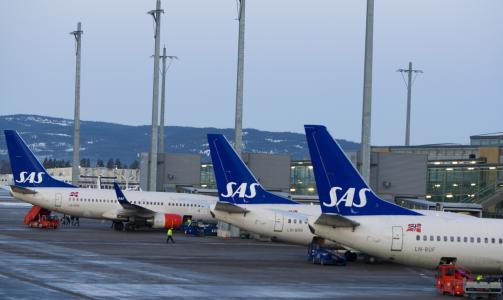 SETTES P� BAKKEN:  Totalt settes 25 SAS fly p� bakken.  3000 ansatte mister jobbene sine. Foto: Heiko Junge / SCANPIX