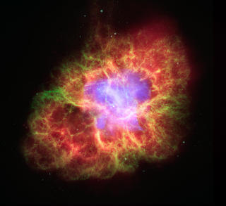 STJERNED�D: Denne stjernen d�de for over 1000 �r siden. N� spyr den ut partikler med h�y energi i den gjenv�rende materien som kalles Crab Nebula. Foto: AFP/NASA/JLP/