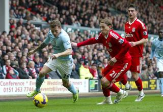 TOK LEDELSEN: Craig Bellamy scoret mot gamle lagkamerater. Foto: Anita Maric / EPA.