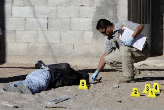 6000 DRAP I �RET: Volden i Mexico har eksplodert, og nesten dobbelt s� mange ble drept i konflikten med mafiaen i 2008 sammenlignet med �ret f�r. Foto: Eduardo Verdugo/AP