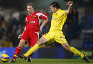 MATCHVINNER: Anders Svensson (t.v) utnyttet et passivt LSK-forsvar. Foto: AP.