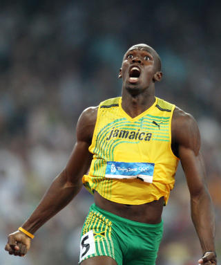 - GANSKE RASK: Usain Bolt omtaler seg selv som �venstrebeint og ganske rask� i en hum�rfylt s�knad om plass i stallen til Manchester United. Foto: Valery Hache, Scanpix/AFP