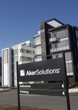 DEL AV STRIDENS KJERNE Aker Solutions lokaler p� Lysaker. N�ringsminister S. Brustad vil vite om aksjon�ravtalen ble brutt da Kjell Inge R�kkes Aker ASA i forrige uke solgte fem selskaper til Aker Solutions. Foto: Morten Holm / SCANPIX