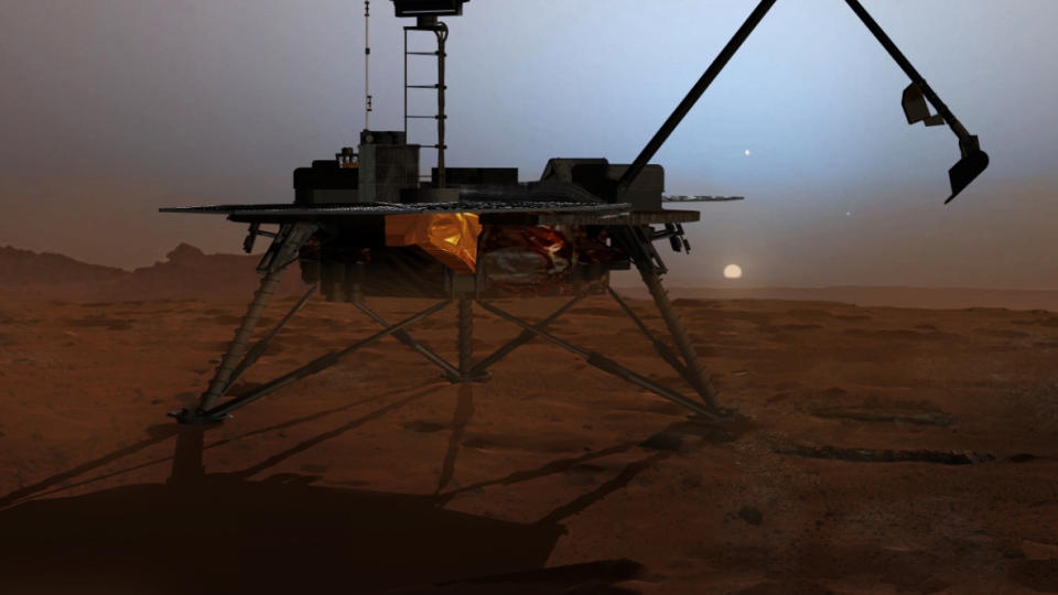 ROMSONDEN PHOENIX: Hviler ut i solnedgangen p� Mars. Sonden er et lite laboratorium med en rekke sofistikerte instrumenter og er utstyrt med et kraftig graveredskap. Foto: NASA