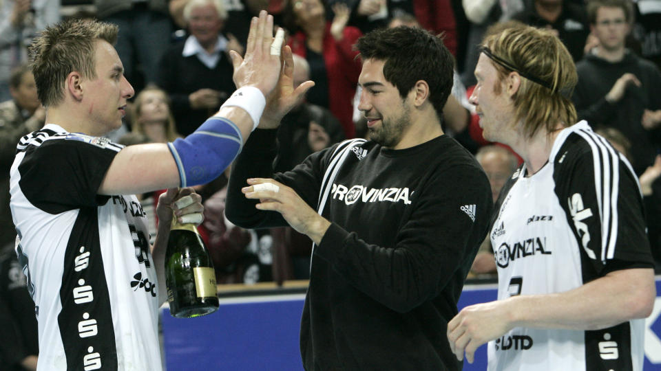 SUVERENE: Filip Jicha, Nikola Karabatic og Norges B�rge Lund kunne feire tidlig tysk seriegull i h�ndball i g�r kveld. Foto: SCANPIX/AP/Heribert Proepper
