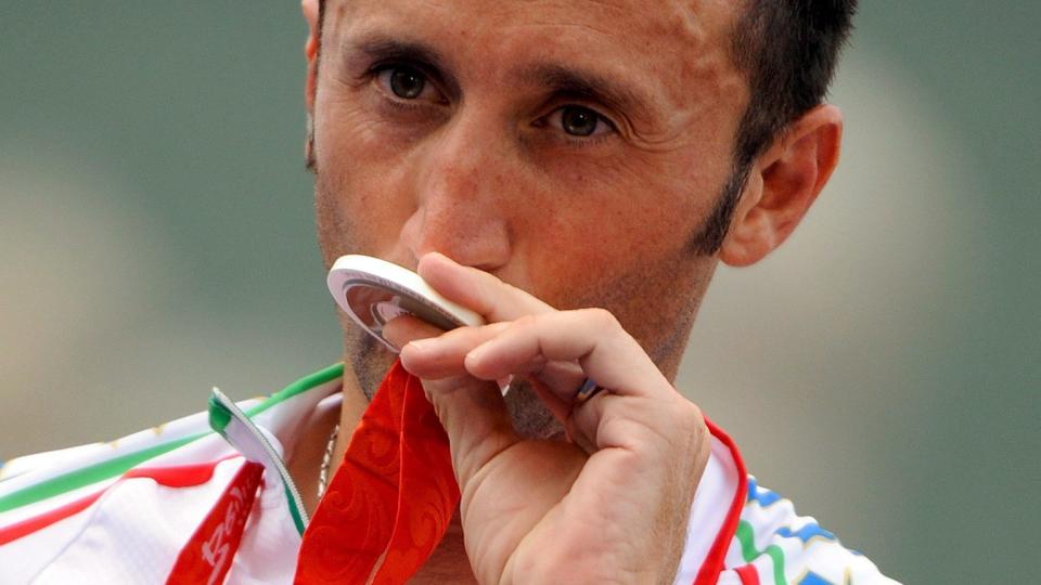AVSL�RT: Den italienske syklisten Davide Rebellin er �n av seks som har testet positivt for Cera i Beijing-OL. Rebellin hevder han er uskyldig.Foto: EPA/GERO BRELOER