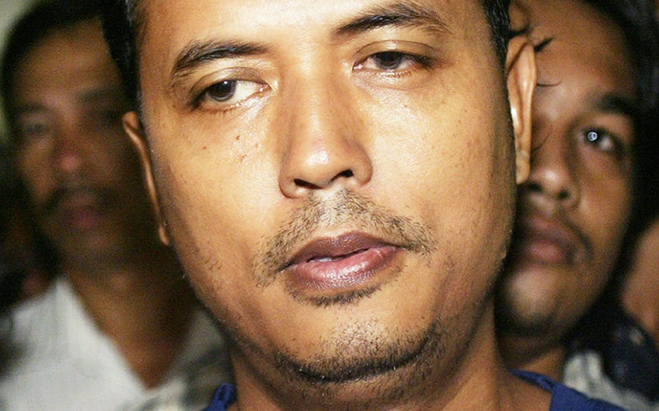 TERRORTATT: Islamisten Mas Selamat Kastari �lte seg f�rst ut av et toalettvindu. Deretter ville han styrte et fly inn i en flyplass. N� er han arrestert i Malaysia. Foto: SCANPIX/AP