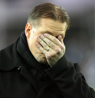 FRUSTRERT FAN: Dette bildet er ikke tatt i kveld, men Kjetil Rekdal h�rtes omtrent ut som han ser ut her da Dagbladet.no snakket med Leeds-supporteren rett etter kampslutt. 
Foto:  Trond Reidar Teigen, Scanpix